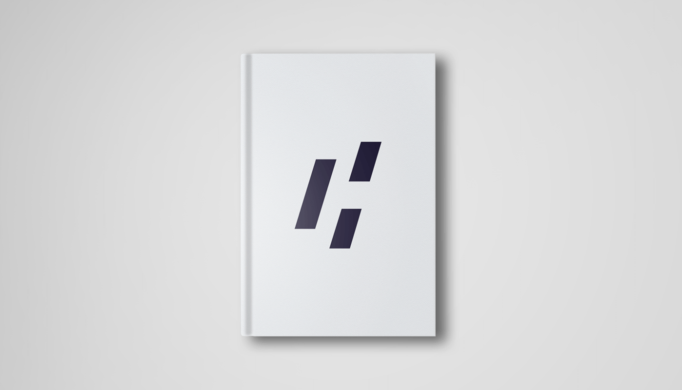 Мокап логотипу "Співтовариство Бізнесменів" на обкладинці білого нотатника - візуальна ідентичність бізнесу Україна