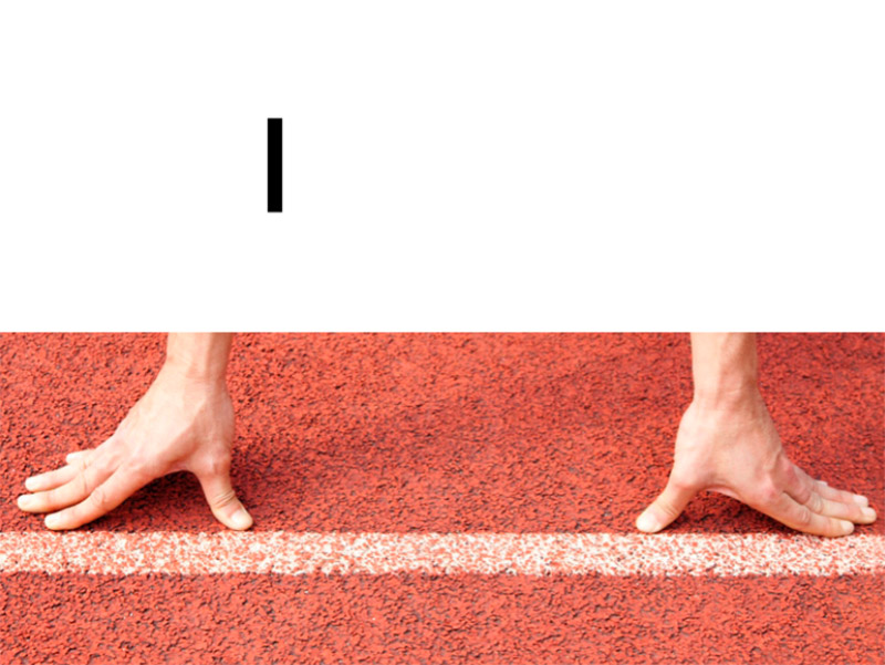 Руки бігуна на стартовій лінії - символ початку спортивних заходів та розробки візуальної айдентики в Києві